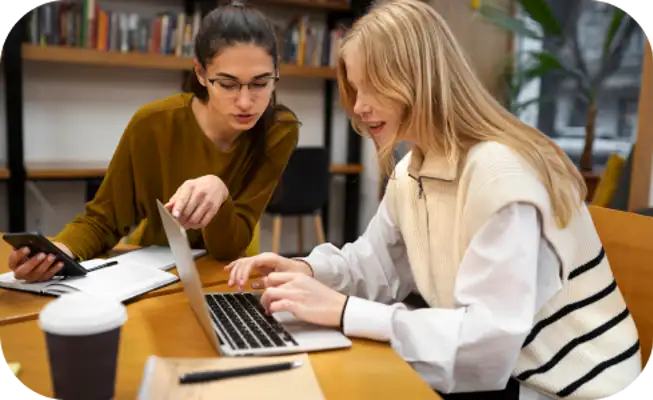 two people at laptop.png